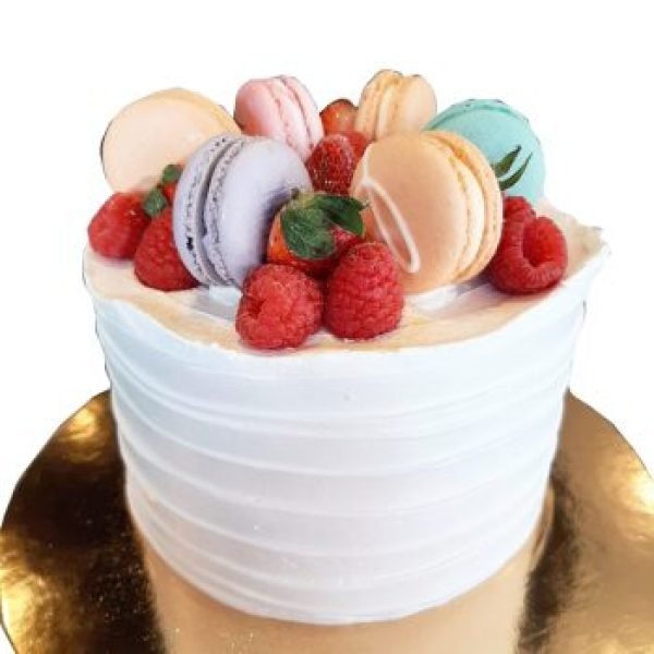 Cake topped with extra macarons